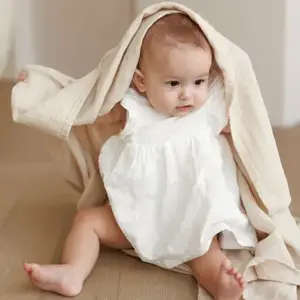 Imagine Muselina multifunctionala din bumbac organic 120x120 cm Onino Hug.me Creamy vanilla