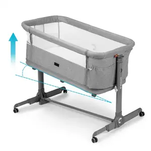 Imagine Patut multifunctonal tip co-sleeper si tarc de joaca pentru copii, Kidnort Snackskal II Grey, structura din otel cu inaltime ajustabila, roti cu frane, buzunar lateral, sistem de balansare incorporat, accesorii incluse